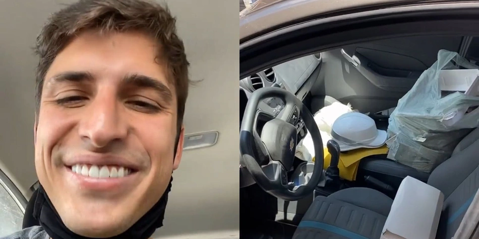 Felipe Prior em seu carro com os pertences devolvidos