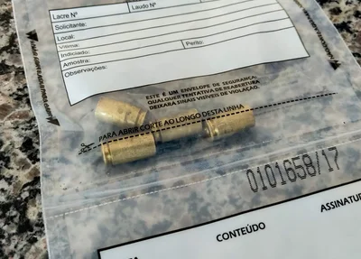 Munições de arma de fogo encontradas no local