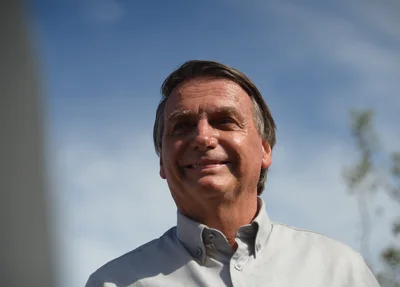 Foto, Presidente Jair Bolsonaro durante visita ao assentamento