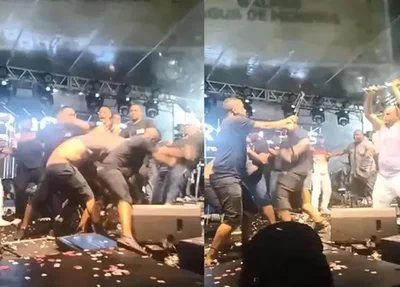 Integrantes das bandas Psirico e Samba Trator brigam em cima de palco na Bahia