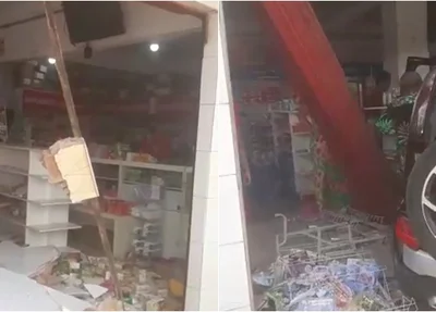 Motorista colide em motoqueiro e invade farmácia