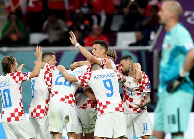Cróacia comemorando gol diante do Canadá na Copa do Mundo