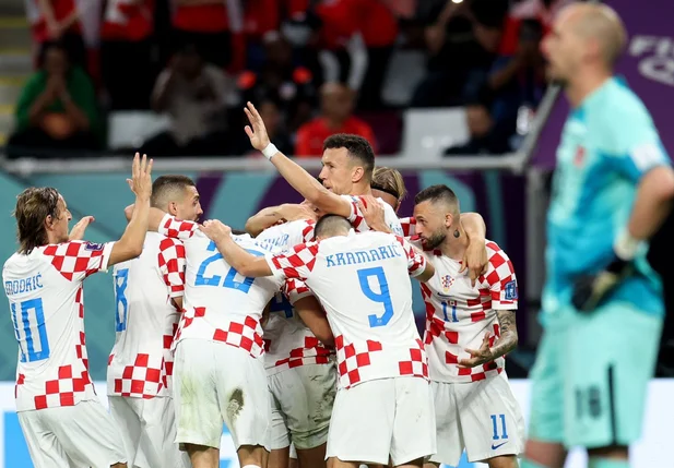 Cróacia comemorando gol diante do Canadá na Copa do Mundo