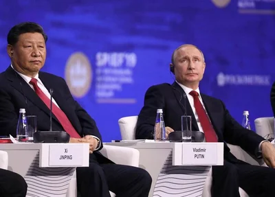 Os presidentes de China e Rússia, Xi Jinping e Vladimir Putin