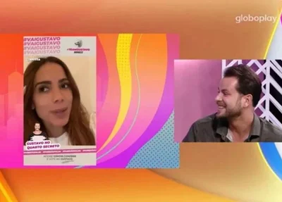 Gustavo assistindo ao vídeo de Anitta