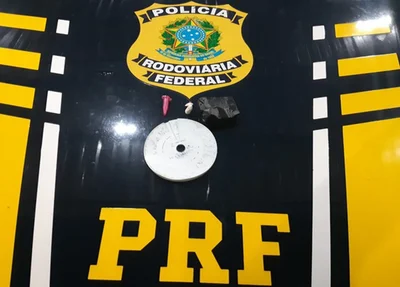 Invólucros com cocaína e disco cronotacógrafo