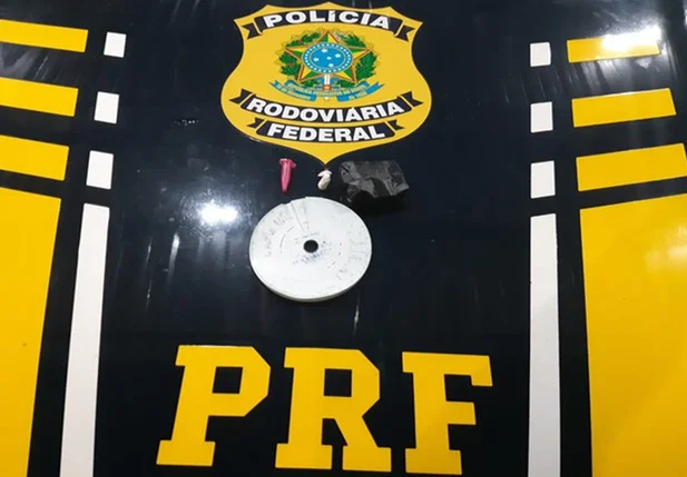 Invólucros com cocaína e disco cronotacógrafo