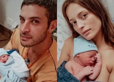 Leandro e Flávia segurando o filho Toni