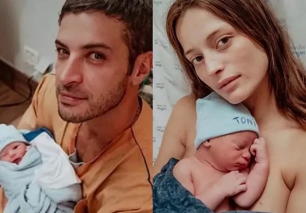 Leandro e Flávia segurando o filho Toni
