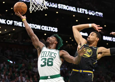 Marcus Smart e Otto Porter Jr.
