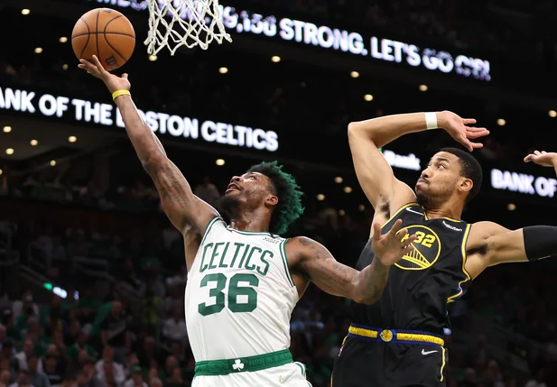 Marcus Smart e Otto Porter Jr.