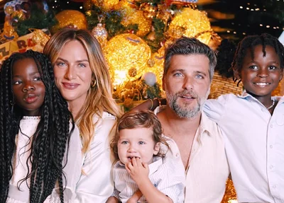 Giovana com o marido e os filhos