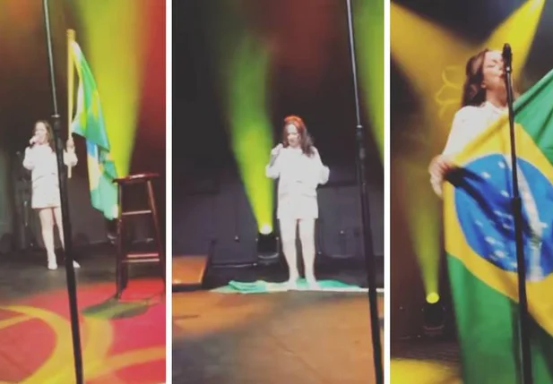Momento em que a cantora Bebel Gilberto joga bandeira do Brasil no chão e pisa sobre ela durante show.