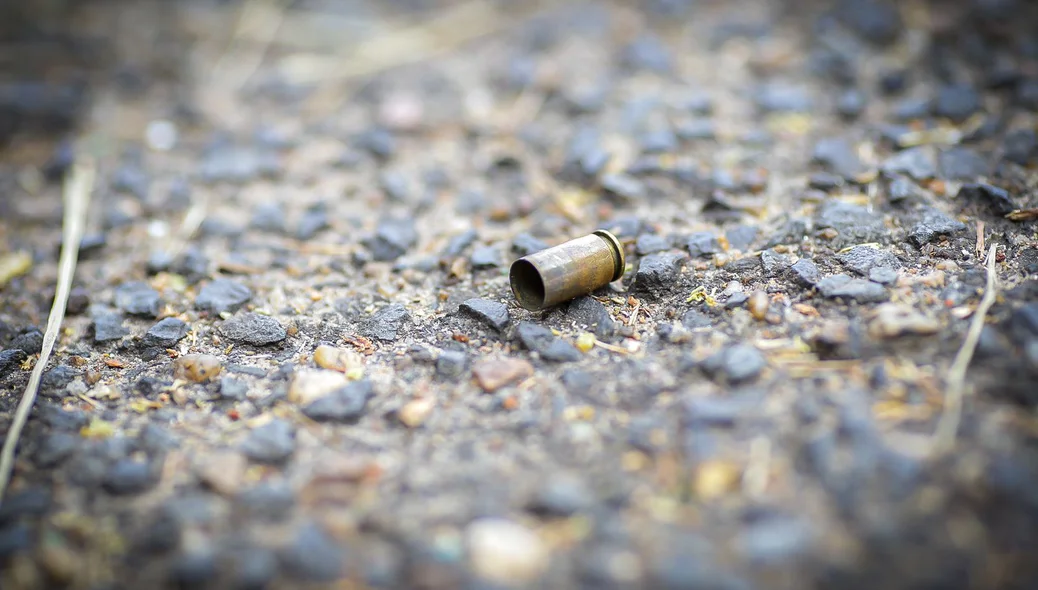 Cápsula de bala deflagrada após o disparo de arma de fogo