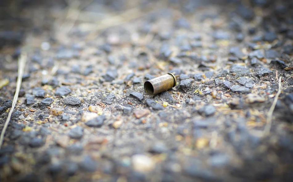 Cápsula de bala deflagrada após o disparo de arma de fogo