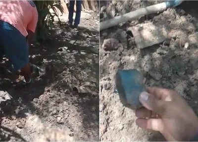 Material encontrado enterrado no quintal da residência.jpg