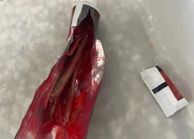 Creme dental que portava maconha encontrado com a infratora