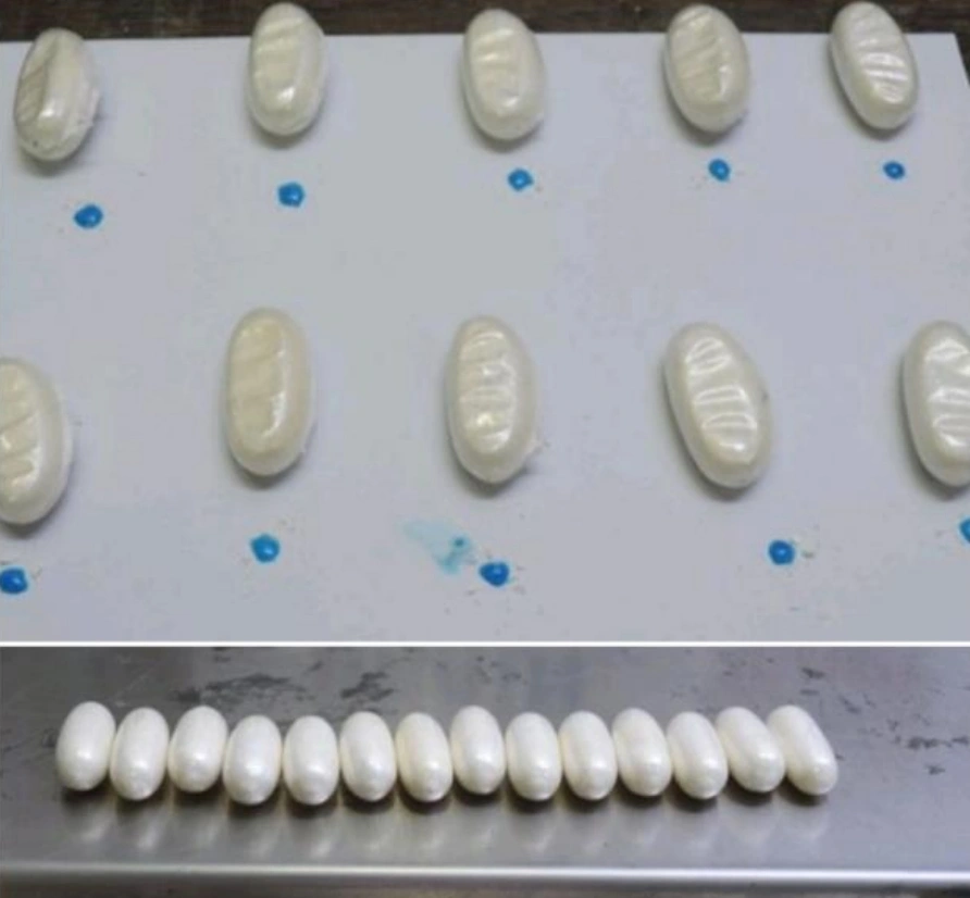 Cápsulas de cocaína encontradas no corpo de Gisele Fernandes Freitas