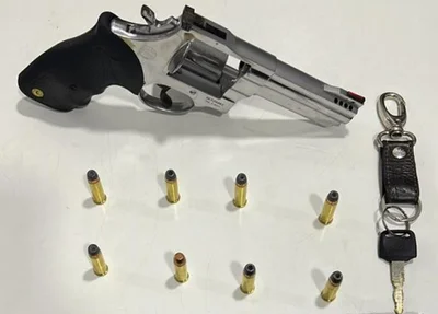 Arma apreendida no imóvel do faccionado