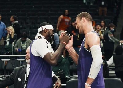 Bobby Portis e Brook Lopez comemoram vitória