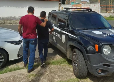 Empresário sendo conduzido pela polícia