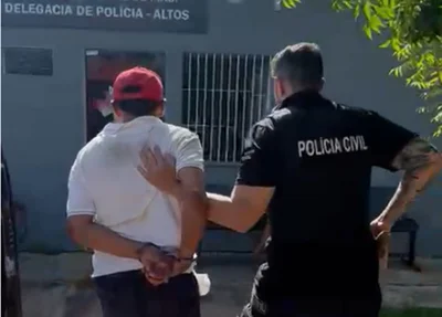 Preso sendo conduzido para o 14º DP de Altos