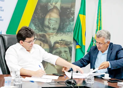 Rafael Fonteles e reitor Evandro Alberto