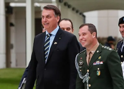 Jair Bolsonaro e Mauro Cid