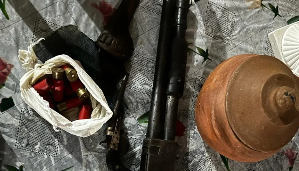 Arma de fogo e munições apreendidas