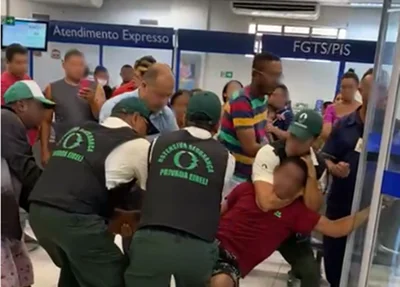 Homem teve que ser contido por seguranças da agência