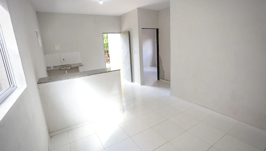 Interior de uma das casas do Orçamento Popular