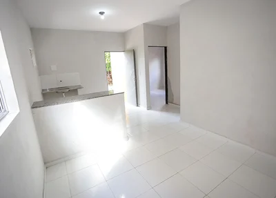 Interior de uma das casas do Orçamento Popular