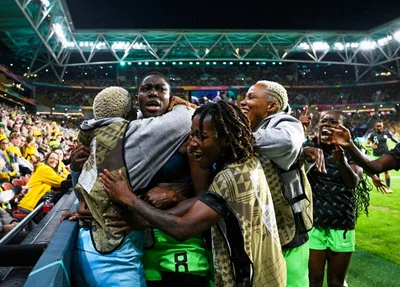 Jogadoras nigerianas comemoram vitória em cima da Austrália