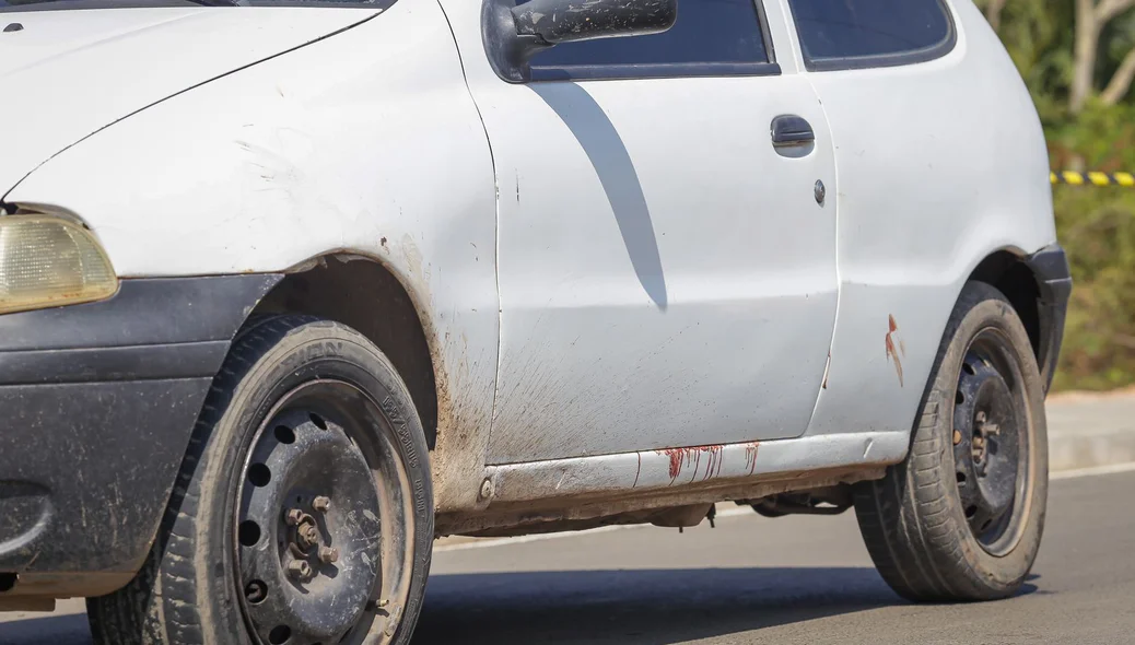 O corpo estava no banco traseiro do carro