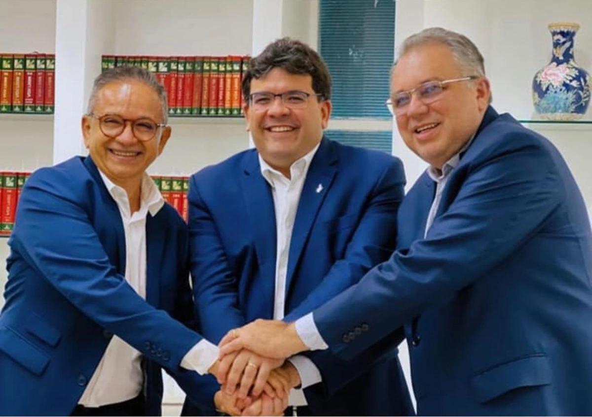 Rafael ladeado por Dr. Hélio Florentino Neto