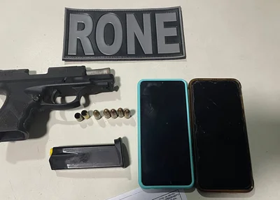 Arma, munições e celulares apreendidos