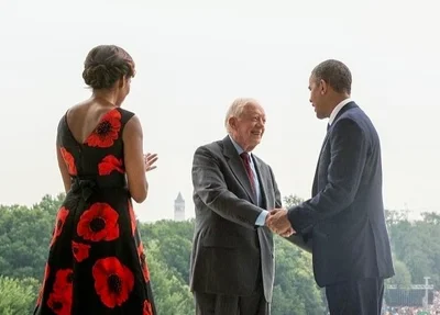Michelle Obama, Jimmy Carter e Barack Obama