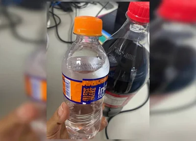 Garrafa de água e Coca-Cola vencidas