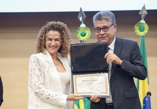 Empresária Jane Moraes ao lado do deputado João Mádison