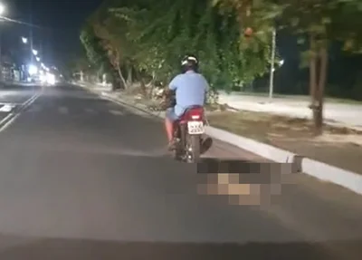 Homem flagrado arrastado cachorro