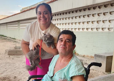 Paciente Antônio da Pádua com a filha e a gatinha de estimação, Maria Sofia