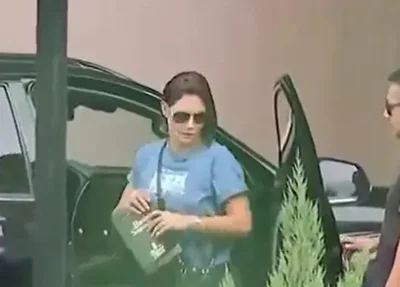 Michelle chegando a sede da PF