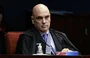 Alexandre de Moraes aparece com tipoia no braço direito