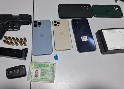 Pistola e celulares apreendidos durante abordagem na Ponte Metálica