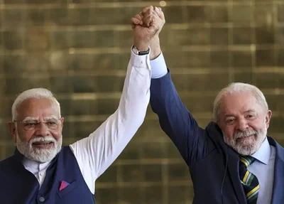 Narendra Modi e Luiz Inácio Lula da Silva (PT)