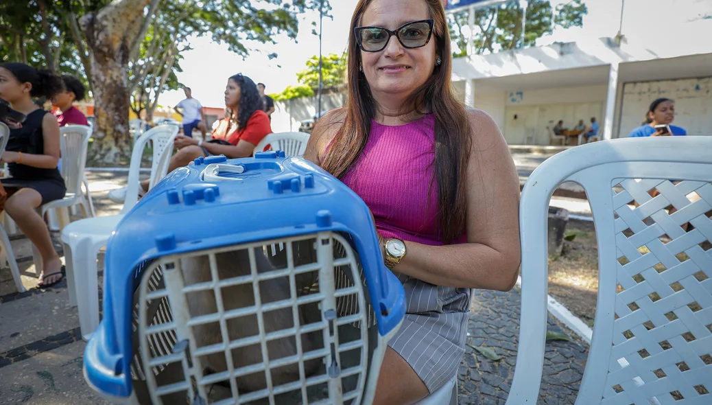 Tutora com seu cachorro no evento