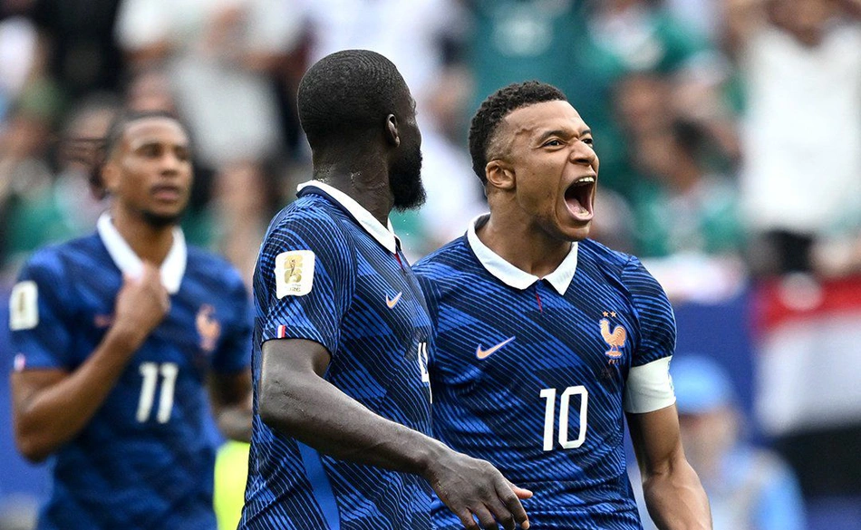 Mbappé comemora seu gol pela França contra Iraque