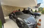 Carros de luxo na casa do CEO da DF Group