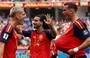 Jogadores da Espanha celebrando o gol diante da Bélgica