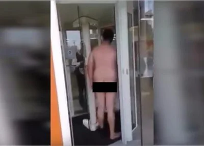 Homem tira a roupa após ser impedido de entrar em banco